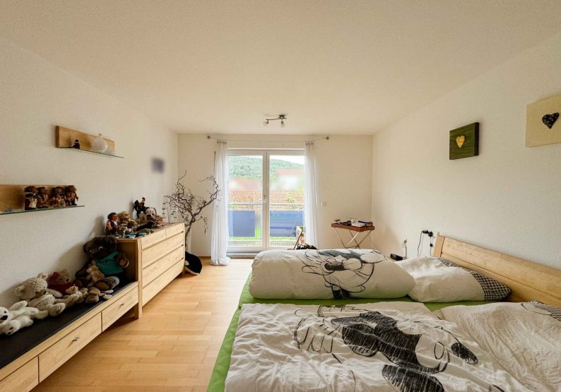 Schlafzimmer mit Balkonzugang